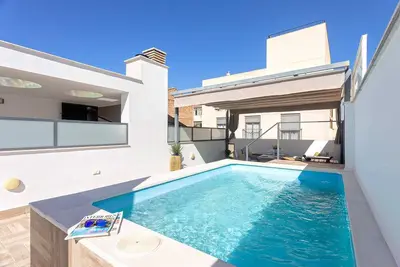 Image de Amazing dúplex with pool in Granada. Velazquez
