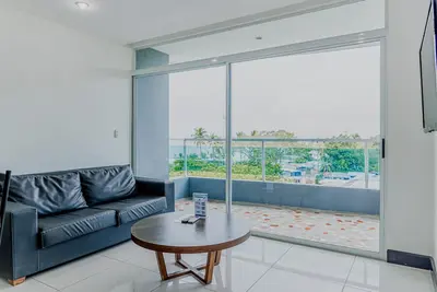 Image de Coastal condo with stunning sea views, rain shower & private balcony escape