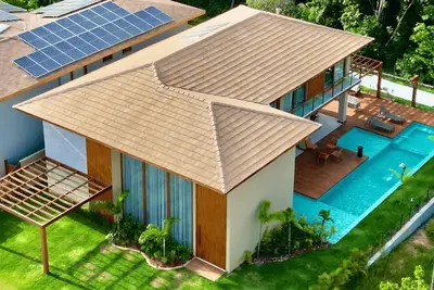 Image de High Standard House with 7 Suites Praia do Forte Condominium Praia Bela with Access to the Sea