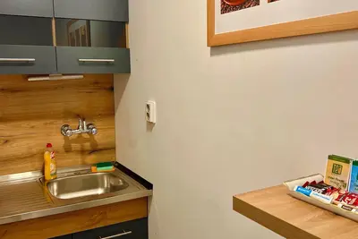 Top Center 3-bedroom semi-basement apartment with WiFi; fits 8 guests