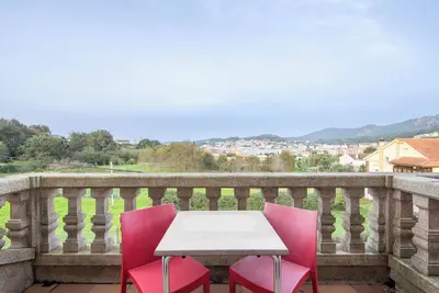 Image de Appartement 'Apartamento 21 Ático' avec vue sur la mer, piscine partagée et Wi-Fi