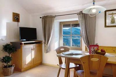 Image de Appartement 'Oberschlichterhof Apt Schlern' avec vue sur la montagne, terrasse partagée et Wi-Fi