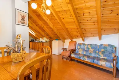 Image de Appartement \"La Golfa\" avec vue sur les montagnes et jardin privé