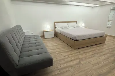 Image de At 100 mt from the sea and train station, room with all amenities