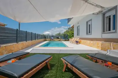 Image de Maison de vacances Kristina avec piscine chauffée