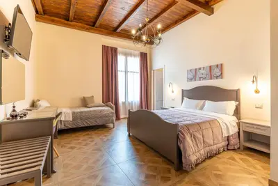 Image de Chambre 'Al Duomo - Camera Tripla' avec Terrasse partagée, Wi-Fi et Climatisation
