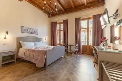Image de Chambre 'Al Duomo - Camera Queen' avec Terrasse partagée, Wi-Fi et Climatisation