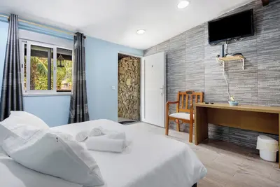 Image de Chambre 'Quarto 7 - Gojim Casa Rural' avec vue montagne, piscine partagée et Wi-Fi