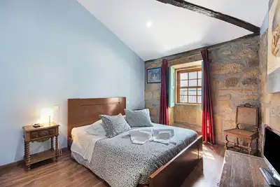 Image de Chambre 'Quarto 2 - Gojim Casa Rural' avec vue montagne, piscine partagée et Wi-Fi
