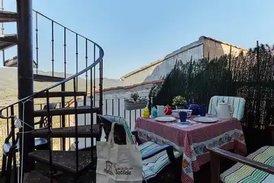 Image de Suite 'La Alcoba Vieja' avec vue montagne et terrasse privée