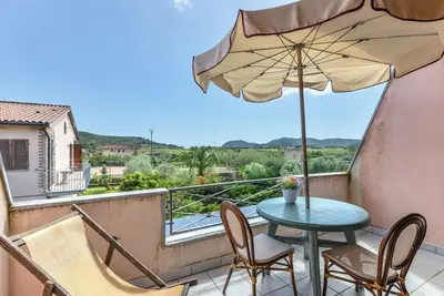 Image de Studio 'Monolocale Dolores' avec piscine partagée, Wi-Fi et climatisation