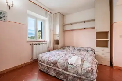 Image de Appartement 'Porcilaia' avec piscine partagée, terrasse privée et jardin partagé
