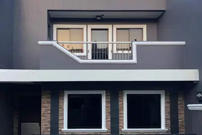 Image de Spacious 4-bedroom City townhouse in Prime location, opposite Polymedic