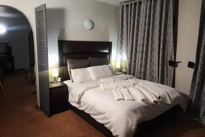 Image de Tranquil cottage with WiFi and pool in Boksburg;   Home away from home.