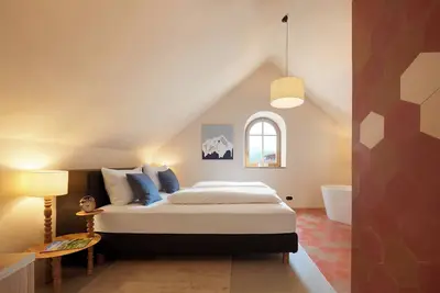 Image de Goldengel Suiten im Herzen von Kaltern