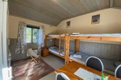 Image de Fiska och bo på Ramsjö camping i stor timmerstuga