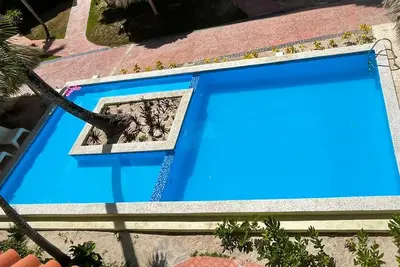 Image de A-101 Apt for beach lover, on the beach with pool