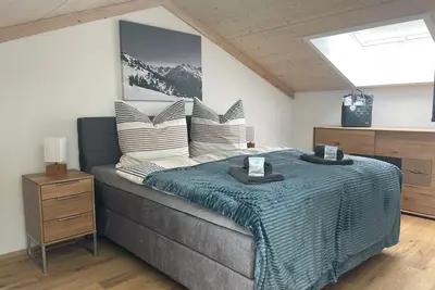 Image de Ferienhäuser Alpenglück - House Gerberstraße Holiday home with sauna and whirlpool