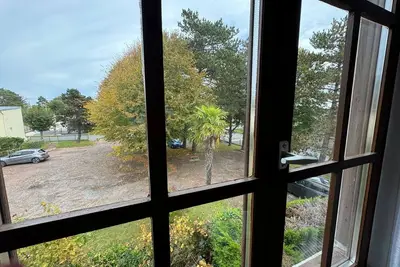 Image de Appartement cosy avec jardin à 10min de la plage