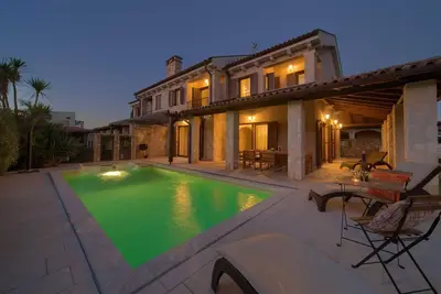 Image de Maison de vacances Seascape Ii avec piscine chauffée près de la mer