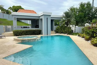 Image de Luxurious 5-Bedroom Retreat with Pool, Rooftop Views & Game Room in Palmas del Mar