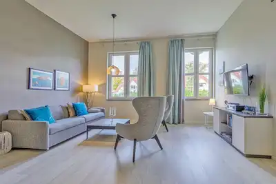 Image de 5 star vacation apartment Lütt Matten - Wellness vacation between the Baltic Sea and the Bodden