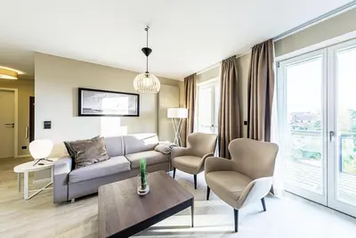 Image de Bodden domicile with balcony, wellness & own beach chair