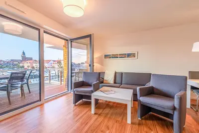 Image de 4-star vacation apartment Hafenblick with a view of the Müritz