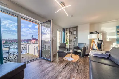 Image de 5-star vacation apartment Hafenflair on the 2nd floor of the Hafenresidenz Waren