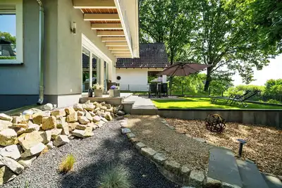 Image de 5-star vacation home SeeZauber in the land of a thousand lakes