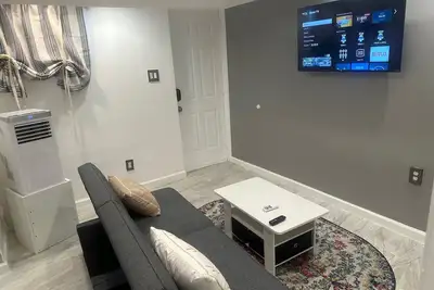 Image de Charming 2-Bedroom Basement Retreat in Uniondale – Ac, WiFi & More!