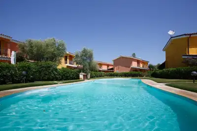 Image de Villa Mama con piscina condominiale, giardino e barbecue
