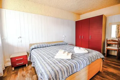 Image de Appartement 'Appartamento Chalet' avec vue sur le lac, piscine partagée et Wi-Fi