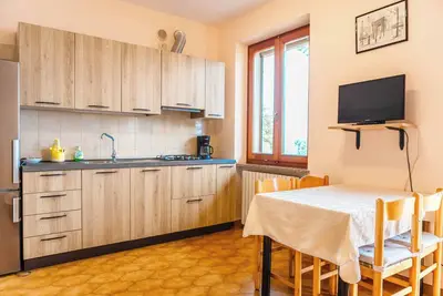Image de Appartement 'Appartamento Chalet' avec vue sur le lac, piscine partagée et Wi-Fi