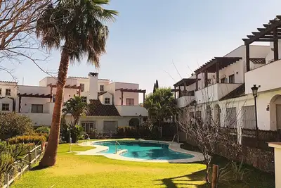 Image de Maison de vacances « Las Lagunetas » avec vue sur la montagne, piscine commune et terrasse privée