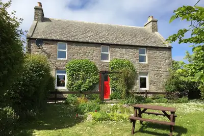 Image de Sherwood Cottage: Traditional 2 bedroom stone cottage in Burray village, Orkney.
