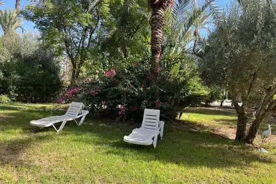 Image de Villa Palmeraie Bien occupé accès a à piscine parc privé
