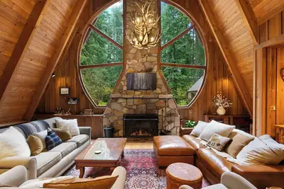 A unique custom home, large chef's kitchen nestled on 3 private acres.