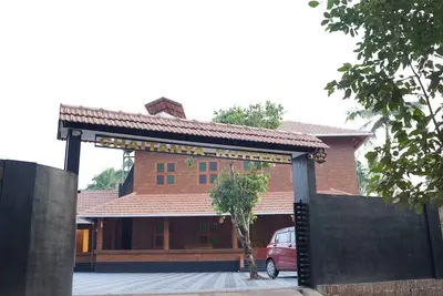 Image de \"Welcome to Malabar Serenity: Where Tradition Meets Tranquility\" 1