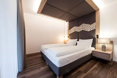 Image de Appartement \"Panorama - Die Panoramasuite\" avec vue sur les montagnes, terrasse privée et Wi-Fi