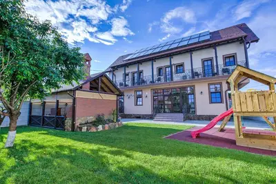 Image de Maison de vacances Cristian pour 1 - 12 personnes avec 5 chambres à coucher - Maison jumelée