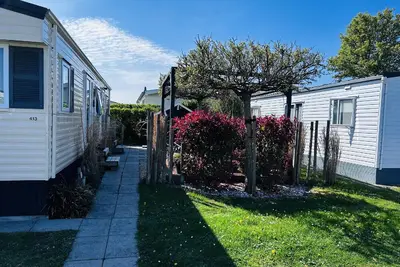 Image de Maison de vacances Vrouwenpolder pour 1 - 3 personnes avec 2 chambres à coucher - Maison de vacances