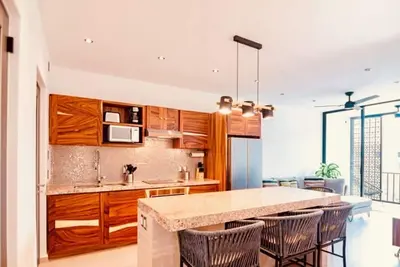 Image de Stunning 2-bedroom condo with rooftop pool & walking distance beach in Huatulco.