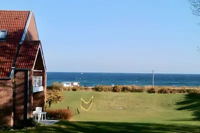 Image de Appartement 'Godewind App A3 Am Ostseestrand' avec vue sur la mer, jardin partagé et Wi-Fi
