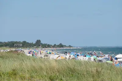 Image de Appartement 'Godewind App E4 Am Ostseestrand' avec vue sur la mer, jardin partagé et Wi-Fi
