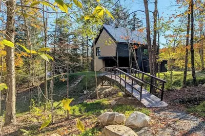 Image de Luxueux Chalet Ambre - Bord de l'eau, Spa et foyer!