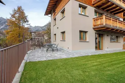 Image de Appartement 'Mortirolo Bormio' avec vue sur les montagnes, jardin privé et Wi-Fi