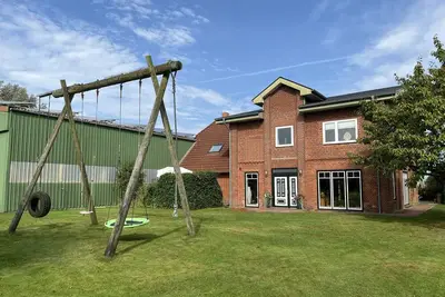 Image de Appartement 'Ferienhof Anke Thiede' avec terrasse privée, jardin partagé et Wi-Fi