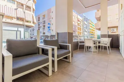 Modern flat on the beach with pool and office