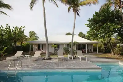 Image de Villa Caraïbes - bord de plage avec piscine